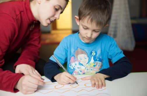 Child drawing in aba therapy session