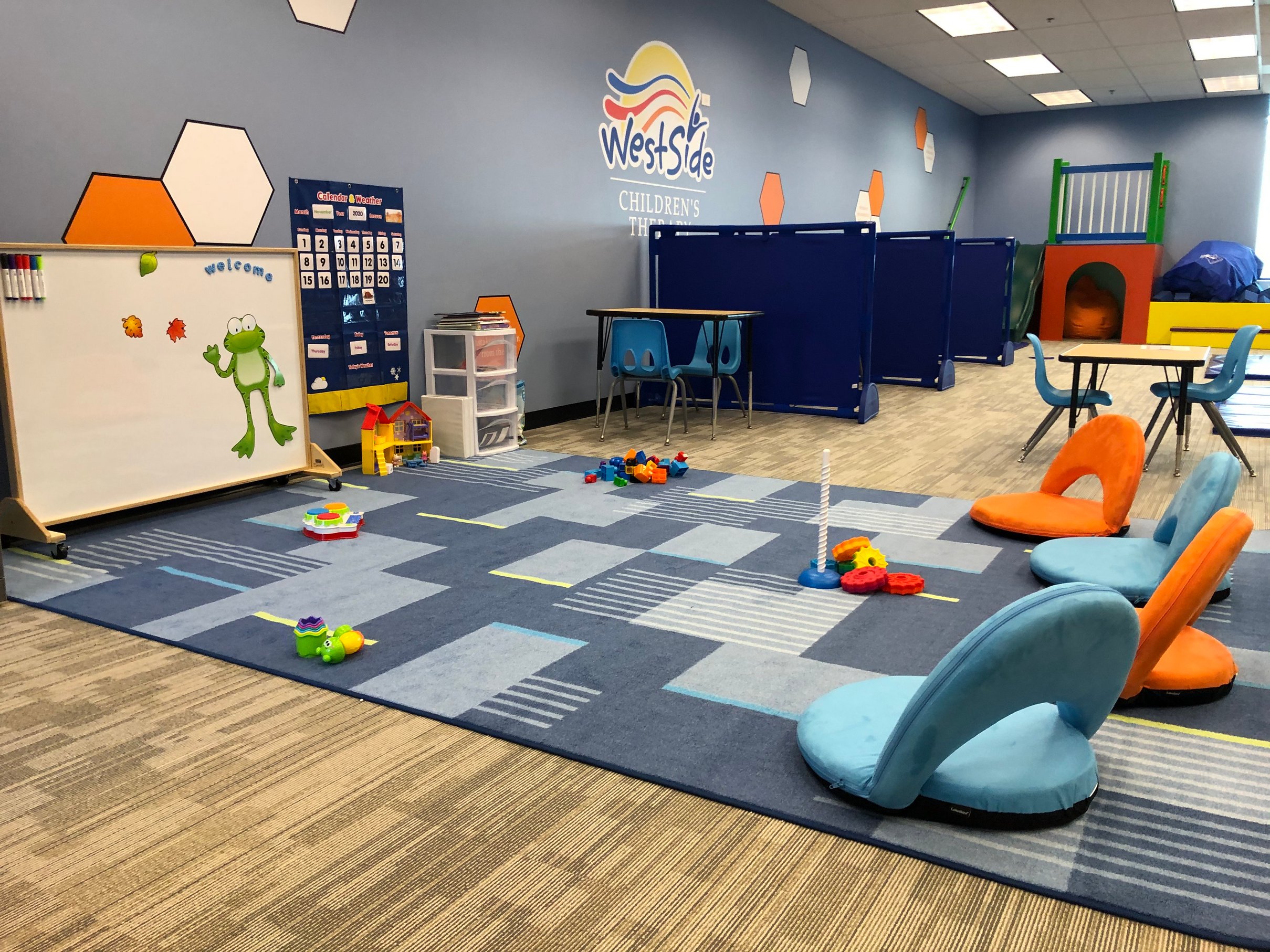 Angled view photo of the activity rug, nooks, and sensory gym at Westside Children's Therapy in Plainfield Illinois clinic