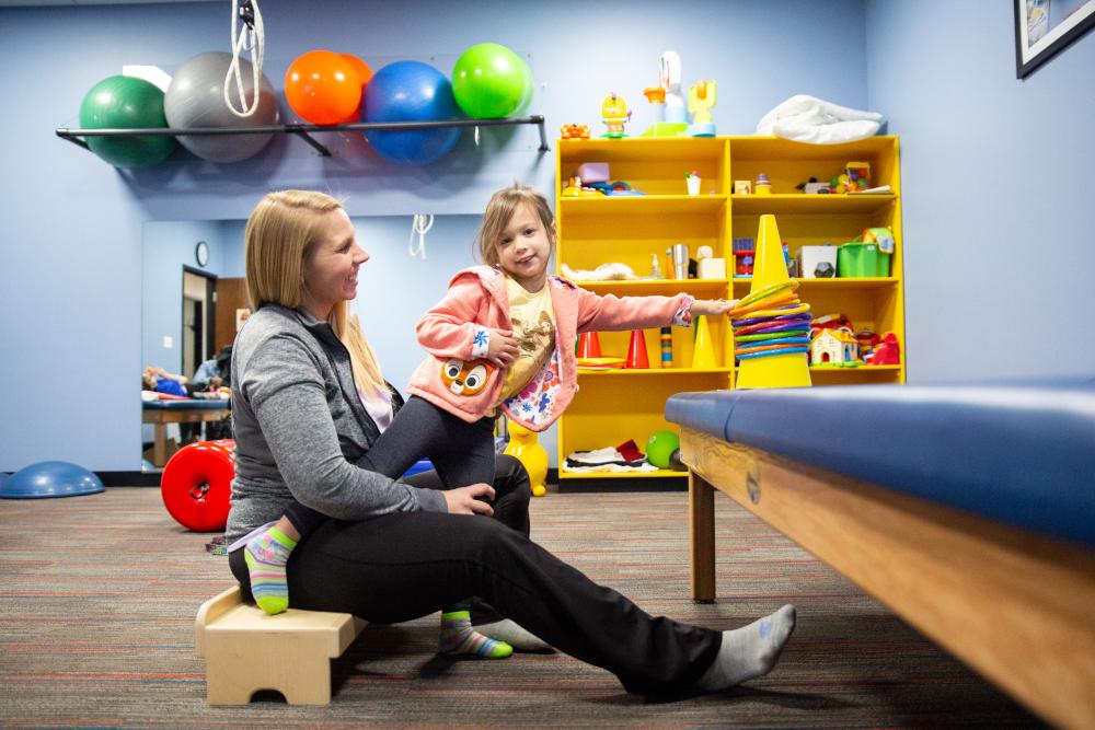 photo of a child with a therapist at Westside in Illinois - photo is used for the when to stop aba therapy blog
