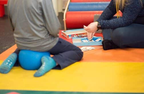 picture of a therapist and a child during in-clinic therapy, as opposed to in-home therapy. This picture is taken at Westside in Illinois