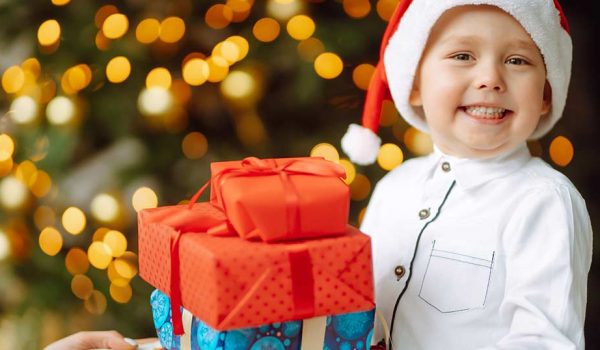 Autistic child getting special sensory gifts during the holiday