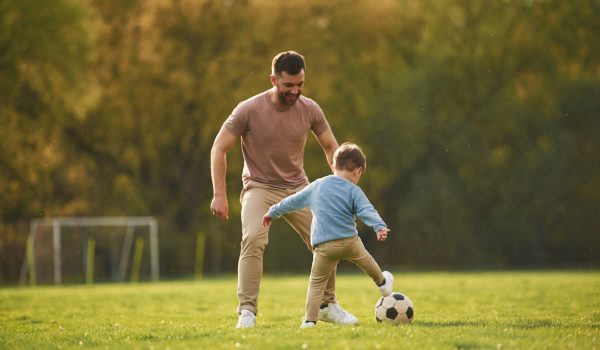 Learning,To,Play,Soccer.,Happy,Father,With,Son,Are,Having